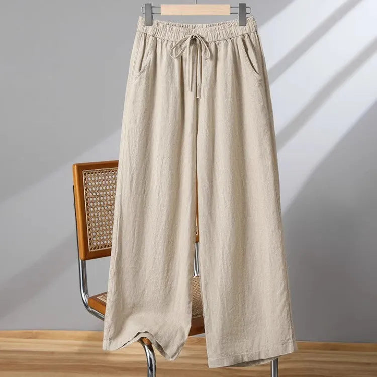 Women's straight-leg casual trousers with an elasticated drawstring waist in apricot colour