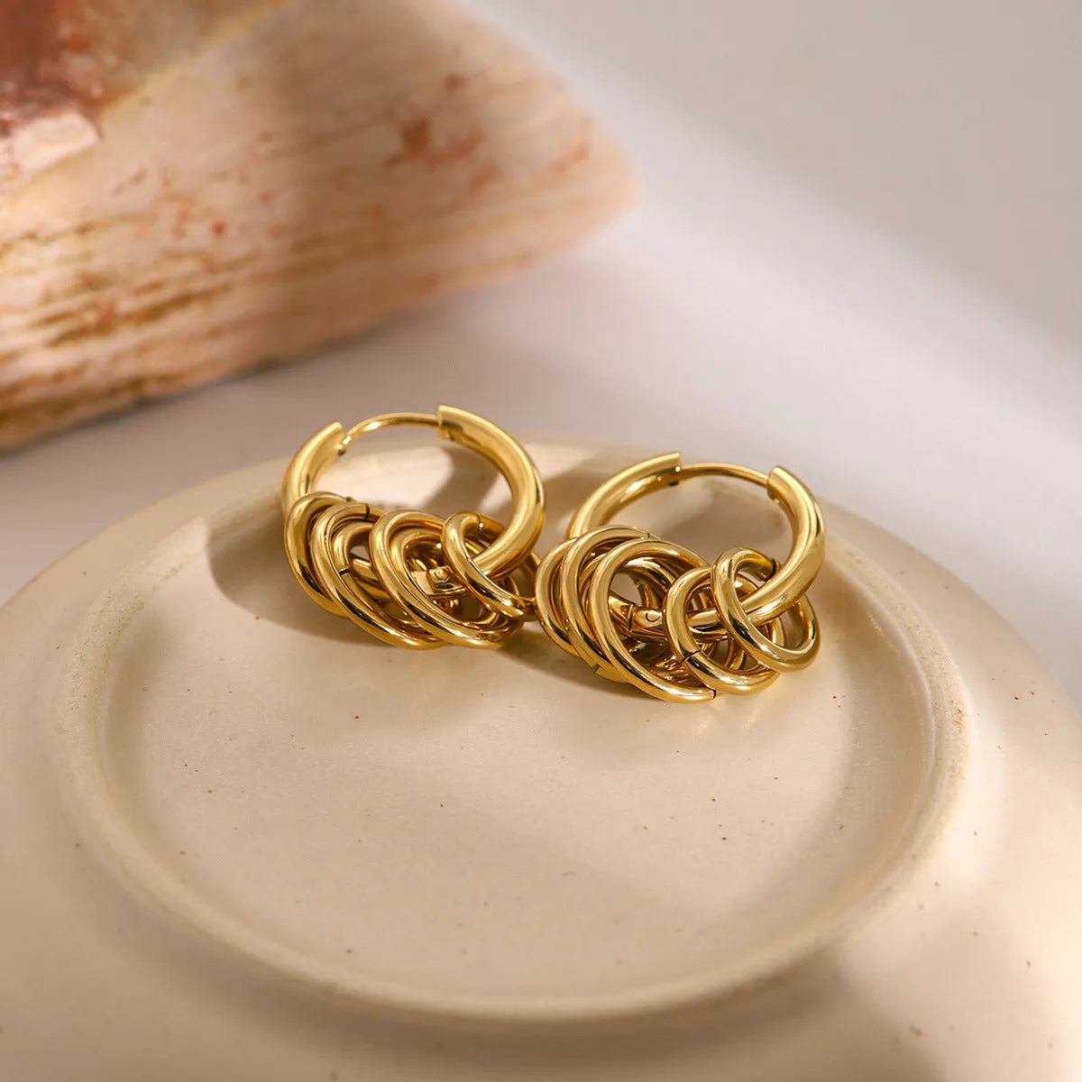 Stainless steel electroplated earrings with colour-matching finish for unisex piercing jewellery