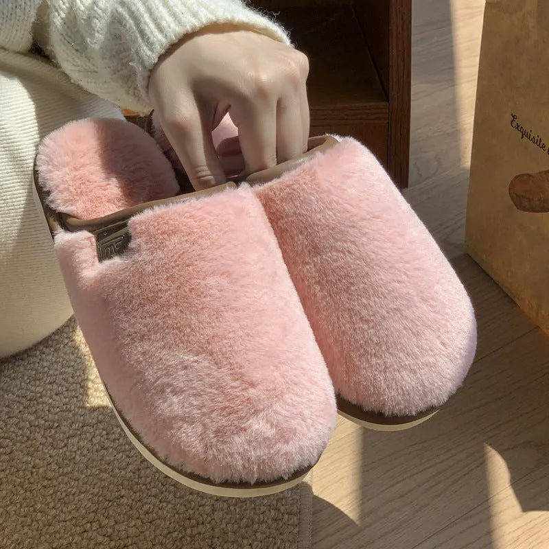 Unisex solid colour plush slippers with non-slip PVC soles and car stitching detail