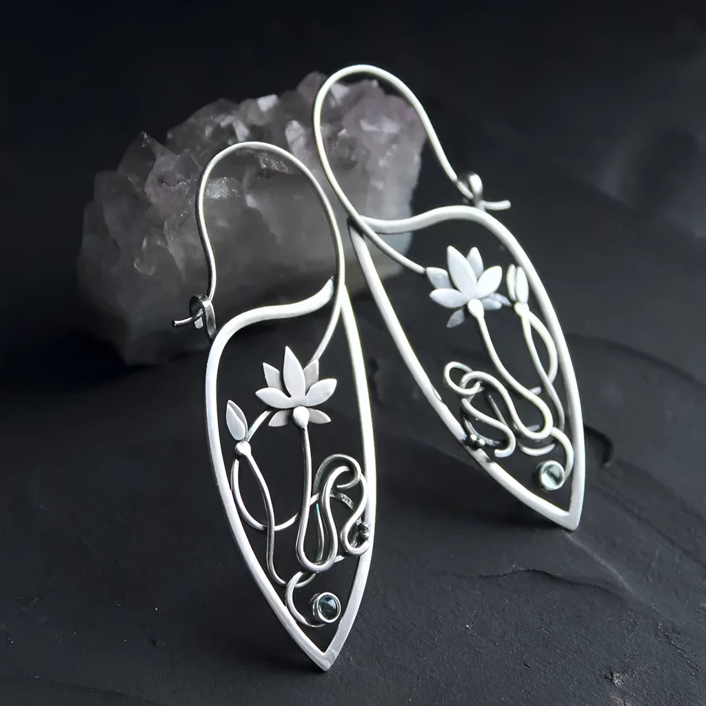 Pair of silver electroplated alloy lotus vine flower geometry earrings for women, retro style