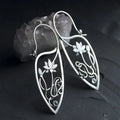 Pair of silver electroplated alloy lotus vine flower geometry earrings for women, retro style