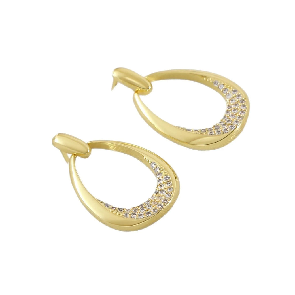 Yellow gold geometric drop earrings with zircon detailing measuring 2.6 by 1.7 centimetres