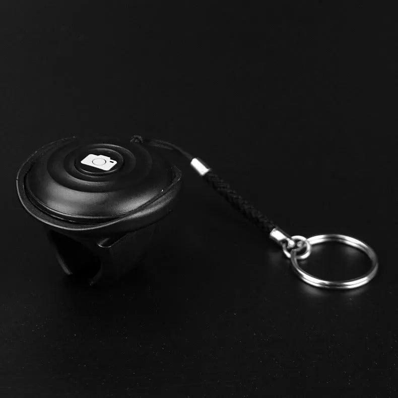 Black Snap Bluetooth remote control shutter for wireless smartphone camera photography
