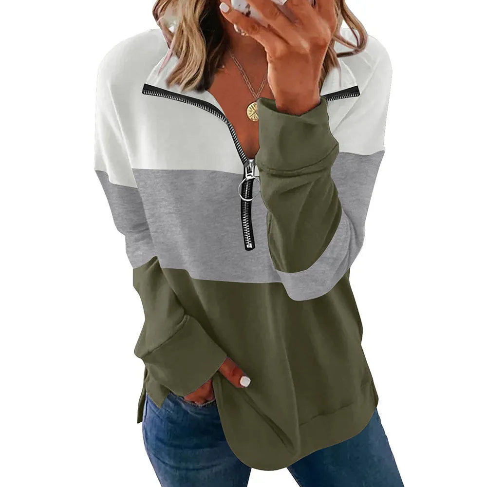 Women's loose long-sleeved leopard print polyester sweater on a hanger