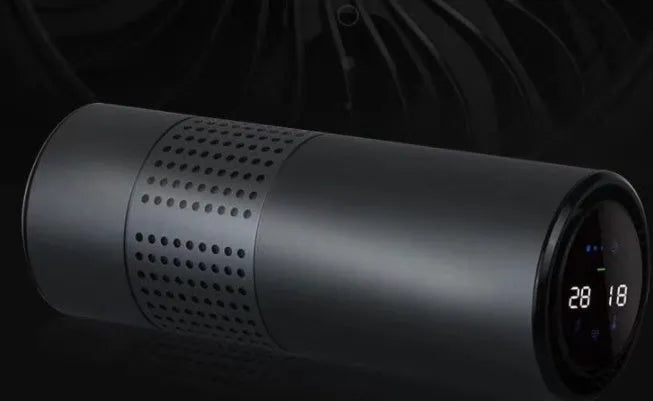 Car air purifier with water cup design and aluminium alloy housing showing air quality display