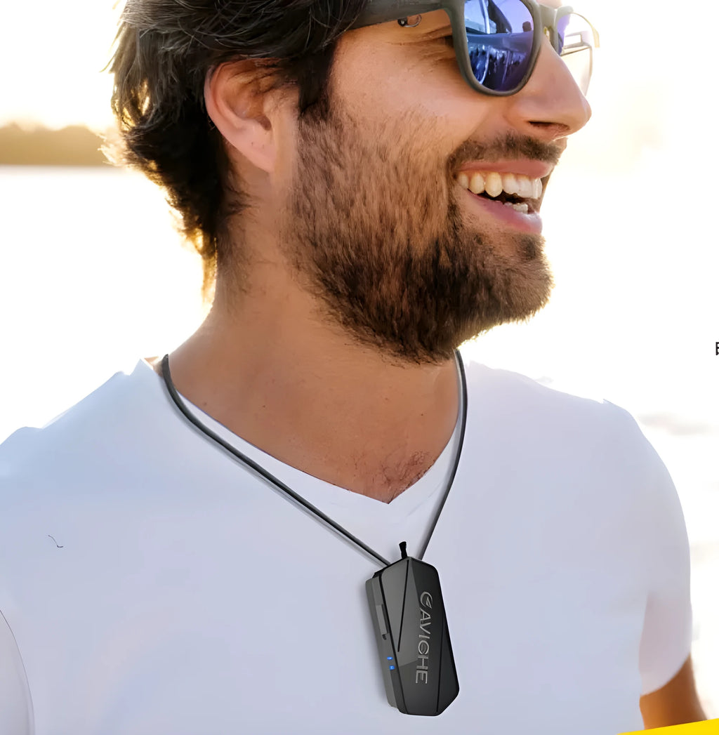Black portable air purifier necklace wearable personal ioniser with plastic housing.