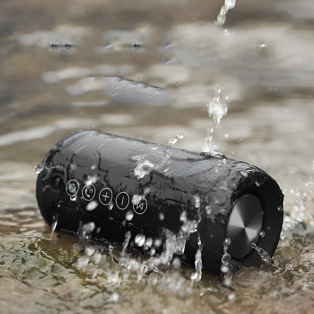 Outdoor waterproof portable Bluetooth speaker in black, camouflage, grey, or red colour options.