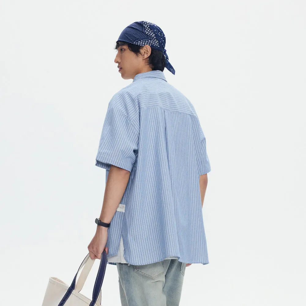 Blue striped overalls short-sleeved shirt for men and women, loose fit cardigan style, cotton blend fabric.