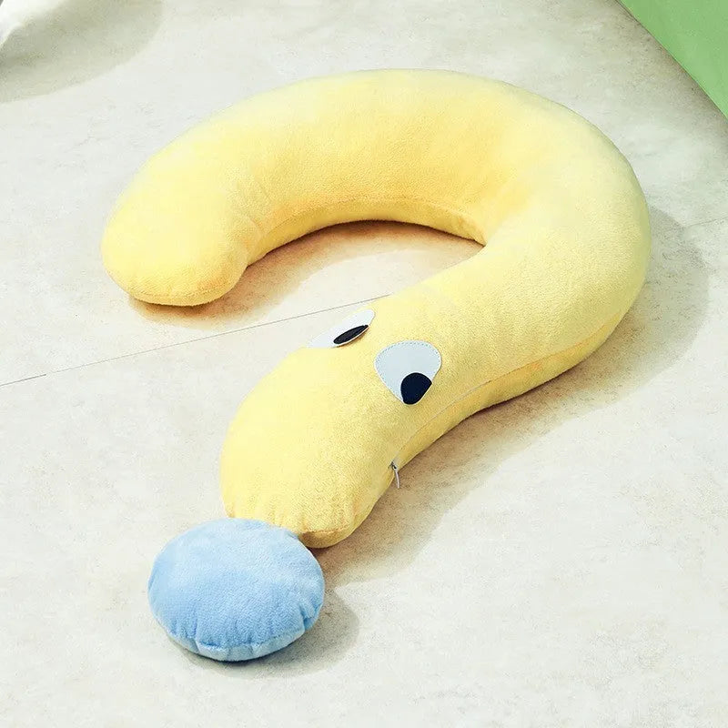 Blue rectangular pet sleeping cushion for cats and dogs on a wooden floor.