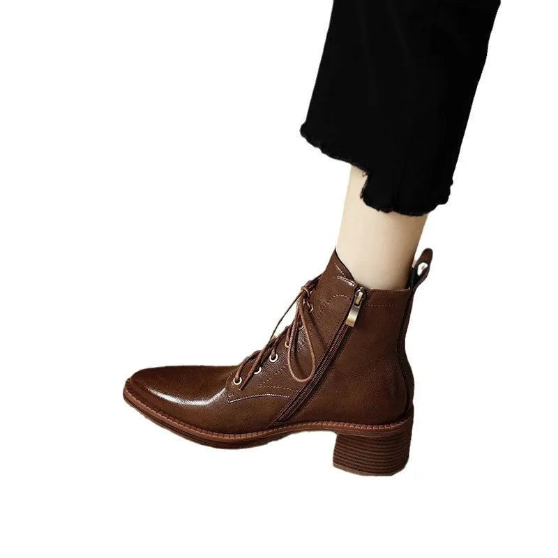 Women's black pointed-toe ankle boots with 5.5cm heel and 13cm shaft height