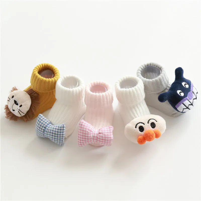 Cotton baby socks in blue bow design showing breathable fabric and size options for 0-3 month olds