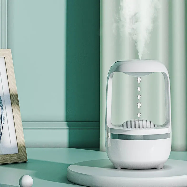 Anti gravity water drop backflow humidifier with 500ml tank in white on a desk
