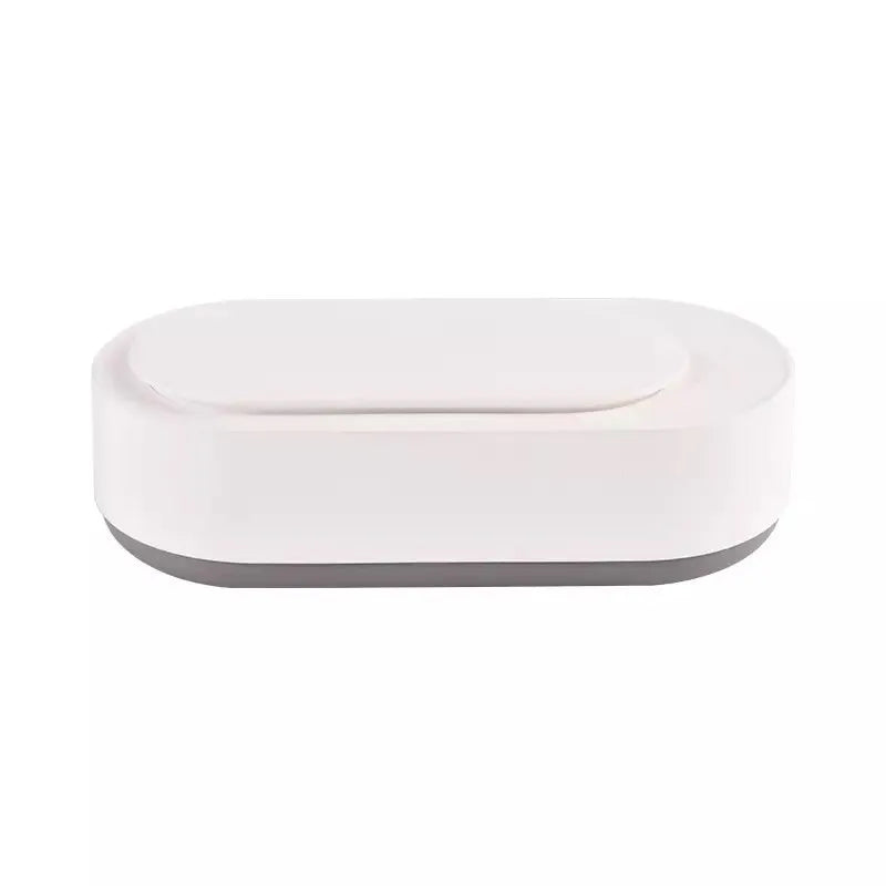 White portable ultrasonic cleaning machine with touch button and stainless steel tank.