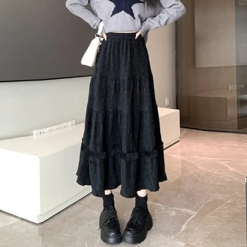 Corduroy A-line midi skirt with elastic waistband in beige colour, showing Korean-style urban design