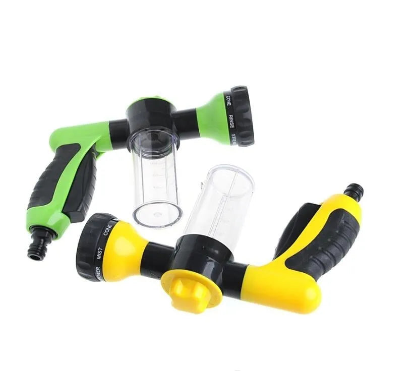 Green high-pressure foam spray gun with adjustable nozzle showing eight spray pattern settings
