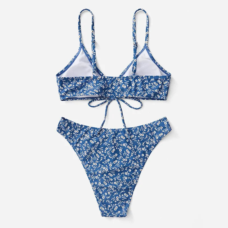 Blue women's swimsuit three-piece set with separate top and shorts
