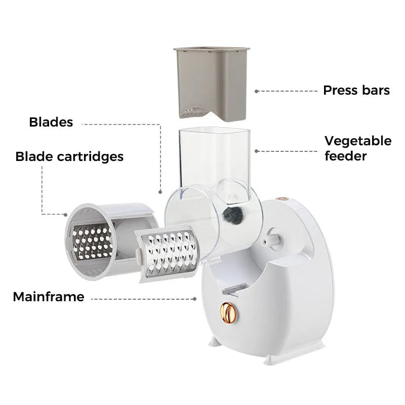 White electric vegetable slicer with rotary blades, suction base, and feeding port on a kitchen counter.