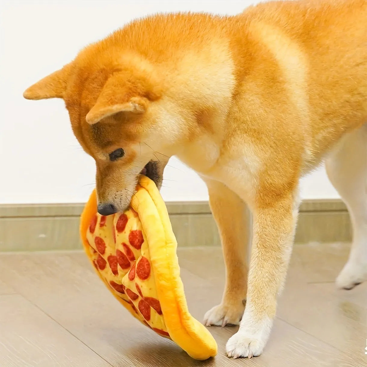 Yellow pizza design dog chewing toy with pepperoni and cheese details, 4 inches diameter