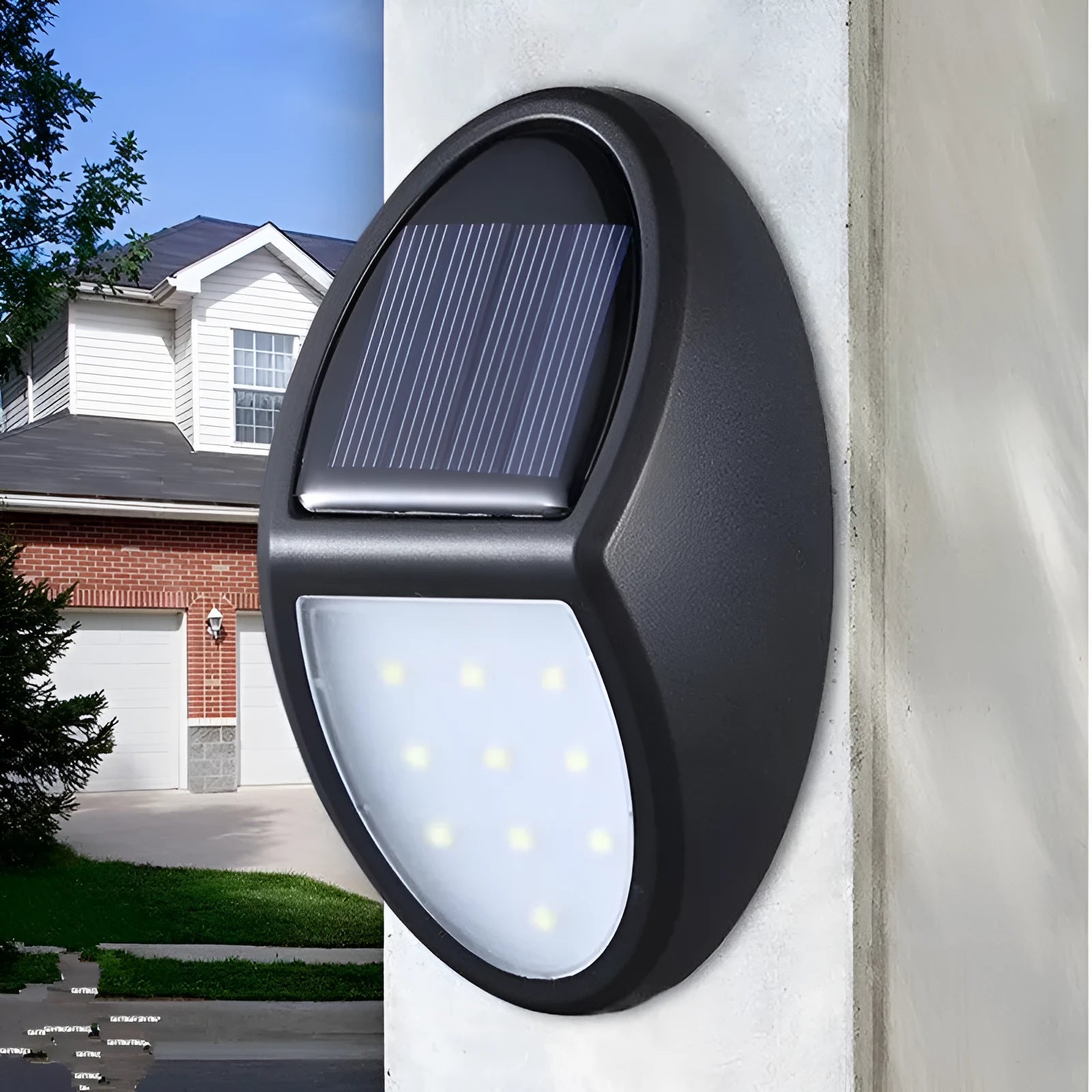 Black rectangular LED solar wall light for outdoor mounting with a solar panel on top.