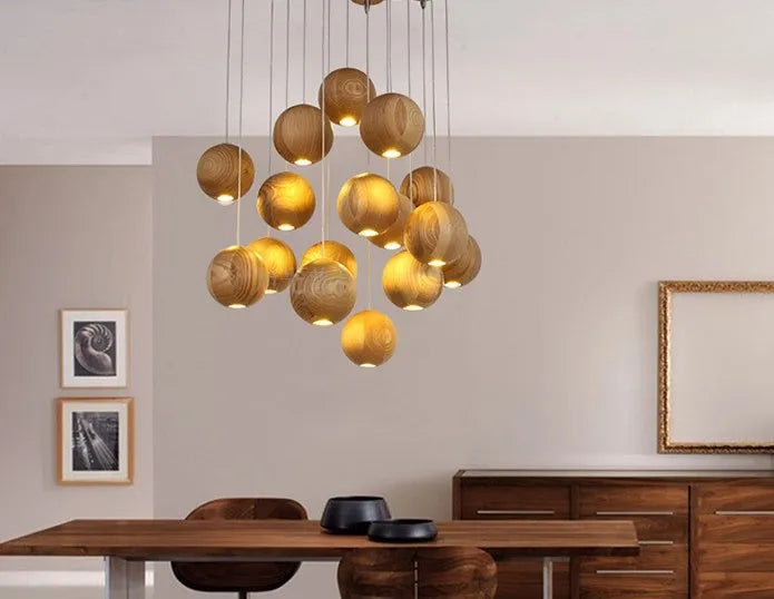 Nordic style solid wood ball chandelier pendant light with adjustable cord.