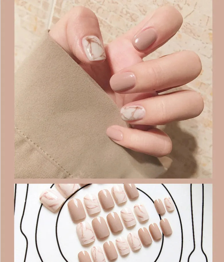 24 light khaki smudge false nails with glue in almond shape on white background