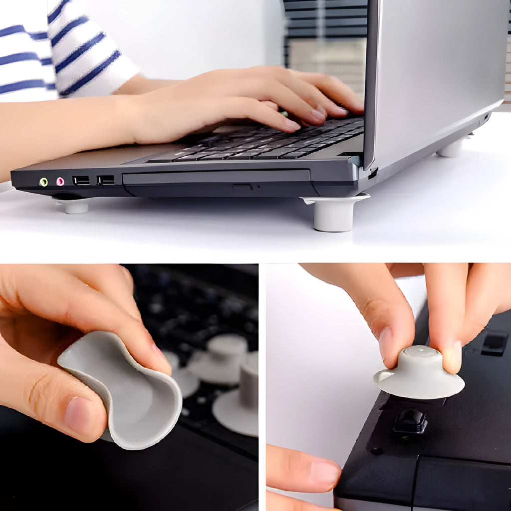 Grey durable plastic laptop cooling pads, two large and two small, on a desk next to a notebook