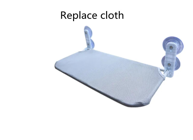 Foldable grey mesh cat hammock with suction cups mounted on a window
