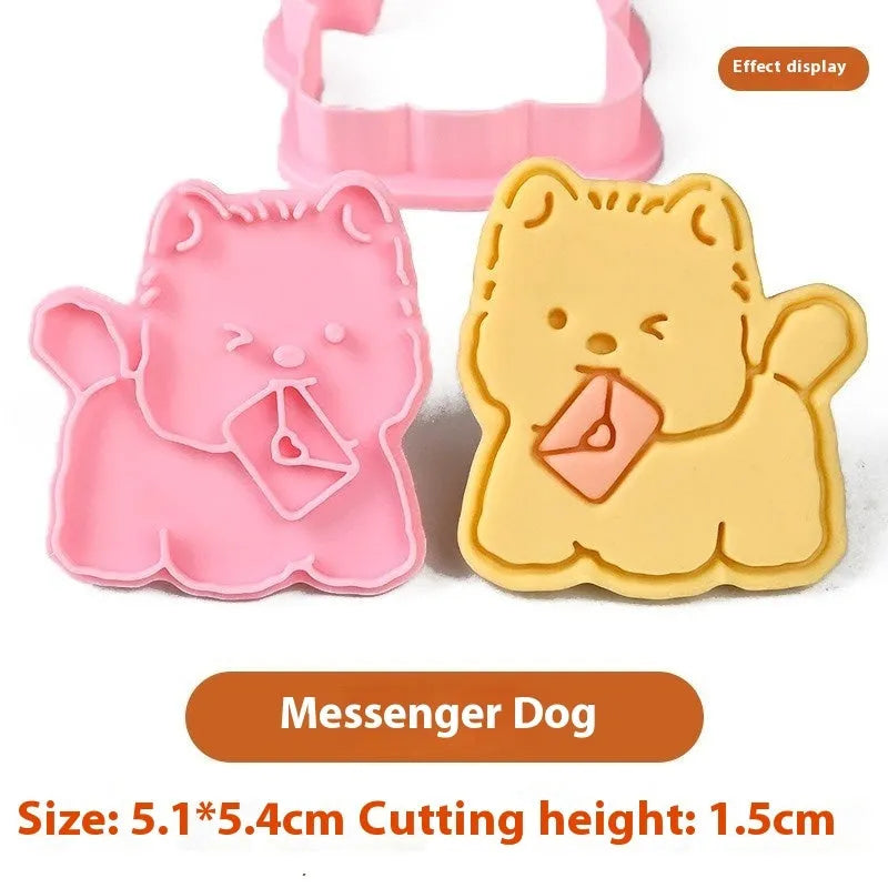 Three-dimensional plastic biscuit mould with cartoon puppy designs including birthday hat and swimming ring patterns