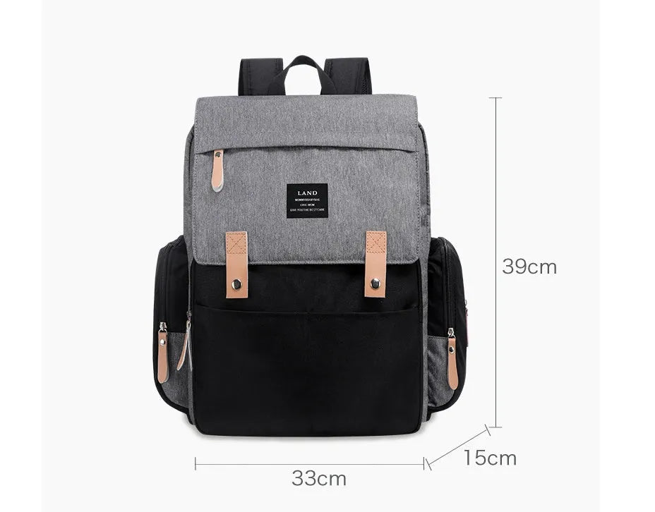 LAND Mommy Diaper Backpack in oxford cloth with changing mat, shown in grey colour.