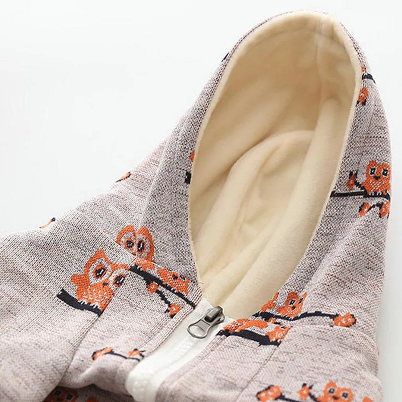 Blue cotton dog pattern sweater zipper coat on a small dog lying down
