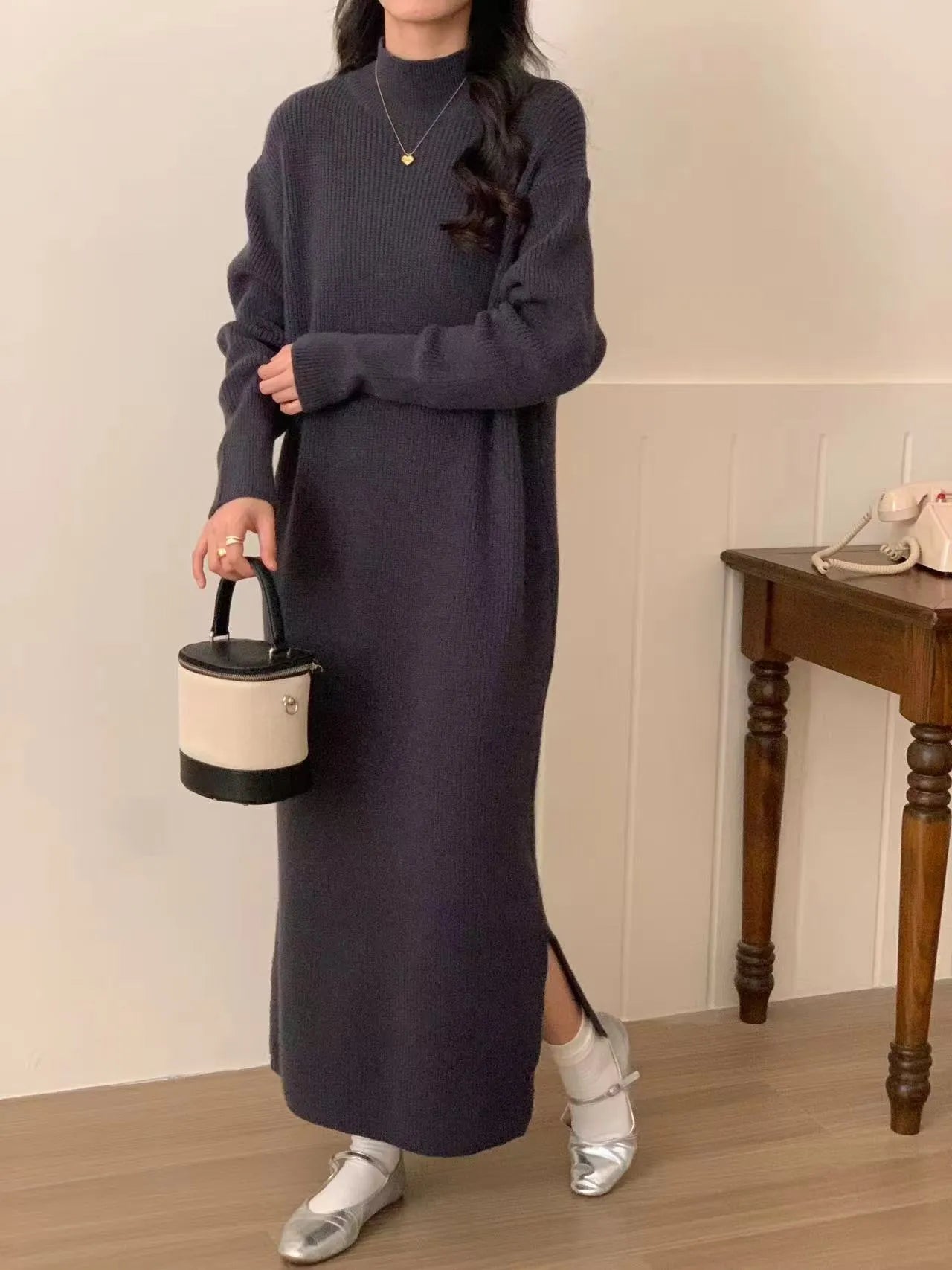 Half turtleneck acrylic knit dress in beige with high waist and midi length for office wear