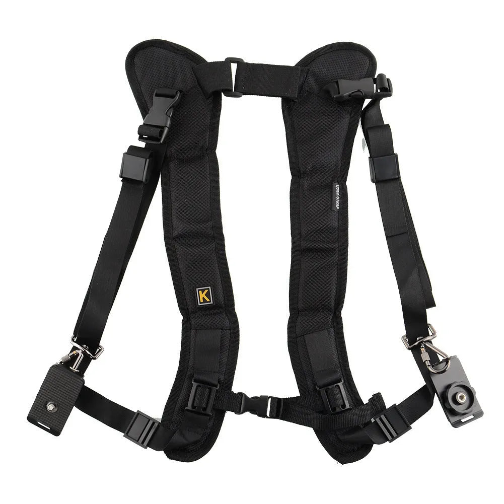 Black professional dual SLR camera harness with shoulder padding shown on a person.