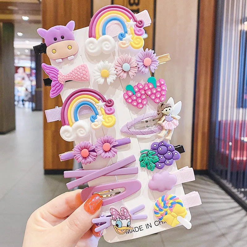 14-piece toddler hair accessories set: colourful rainbow, fruit, and butterfly barrettes in soft silicone clay.