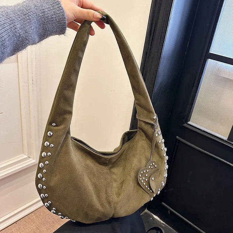 Soft plush strapless tote handbag in a retro style, shown in multiple colour options.