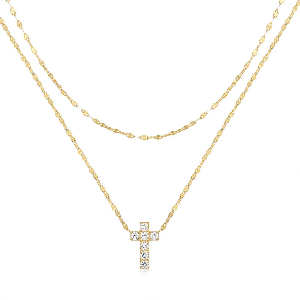 Sterling silver double layer twin diamond cross pendant on a clavicle chain.
