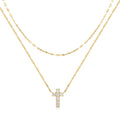 Sterling silver double layer twin diamond cross pendant on a clavicle chain.