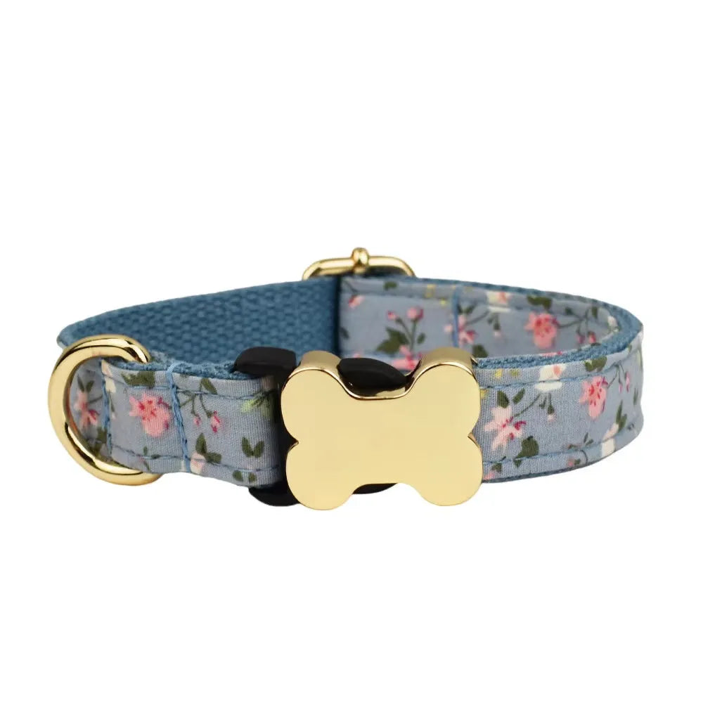 Flat nylon dog collar with a bone-shaped buckle and a printed grid pattern.