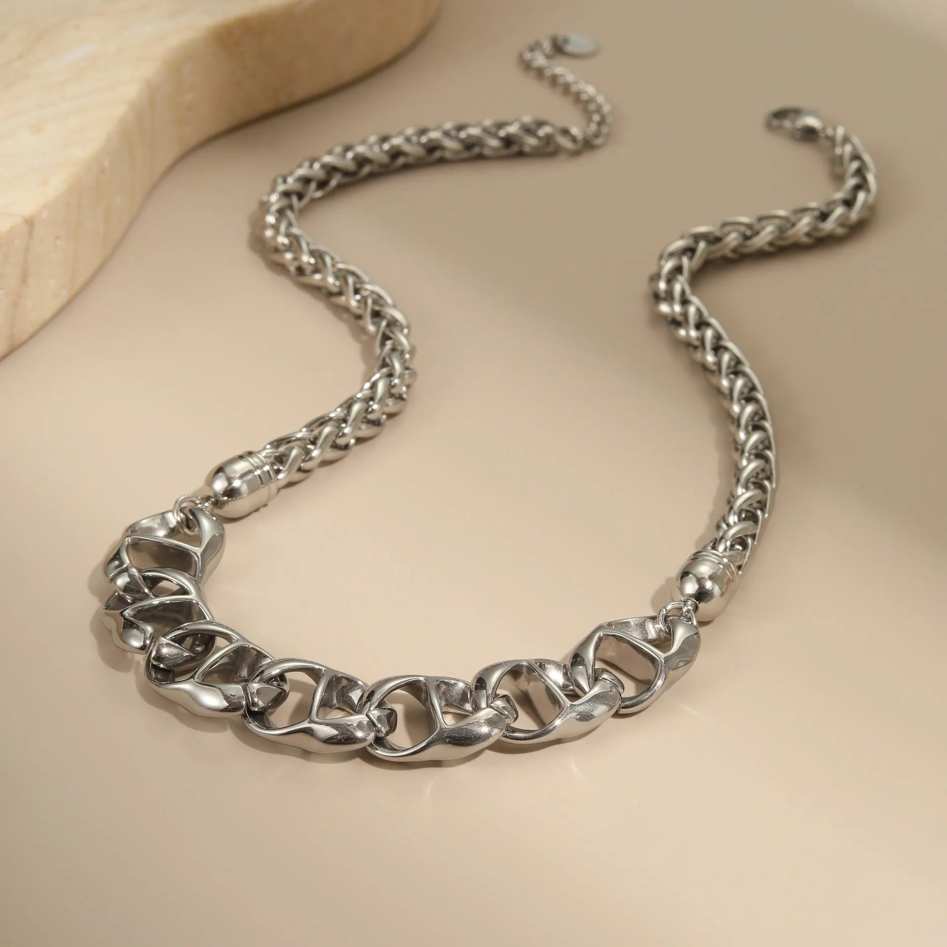 Stainless steel women's necklace with geometric pendant and gold plating