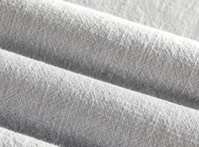 Men's loose fit cotton linen casual shirt in beige, shown on a hanger