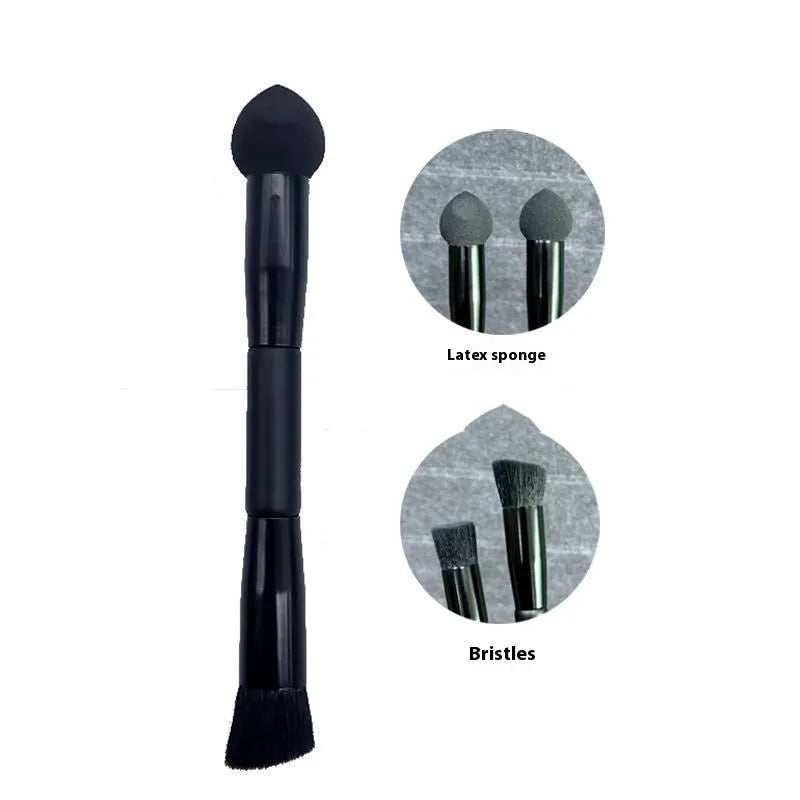 Black sponge stick concealer brush with wooden handle on white background