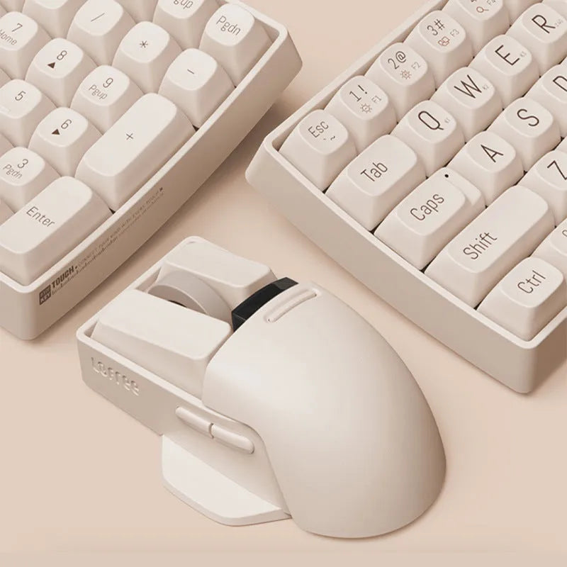Xiaoqiao Tofu colour wireless mouse with 7 buttons and scroll wheel on plain background