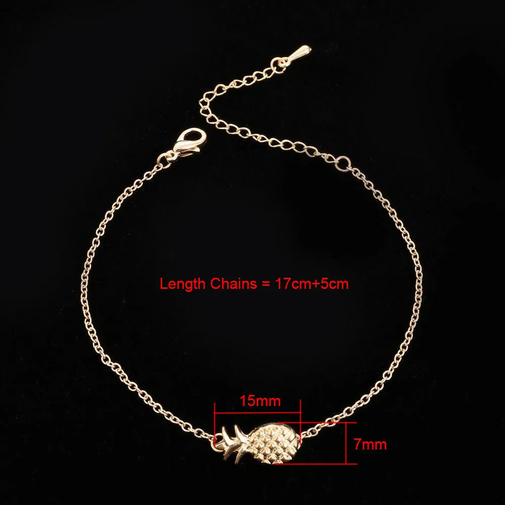 Gold and silver alloy pineapple charm bracelets on a white background.