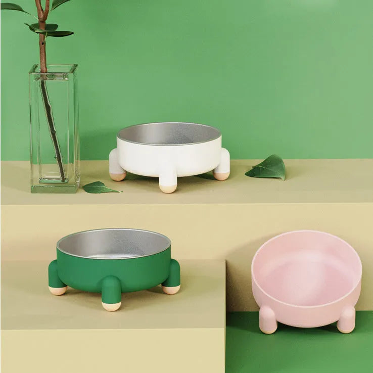 Green stainless steel pet bowl with a non-slip base and raised high-foot design.