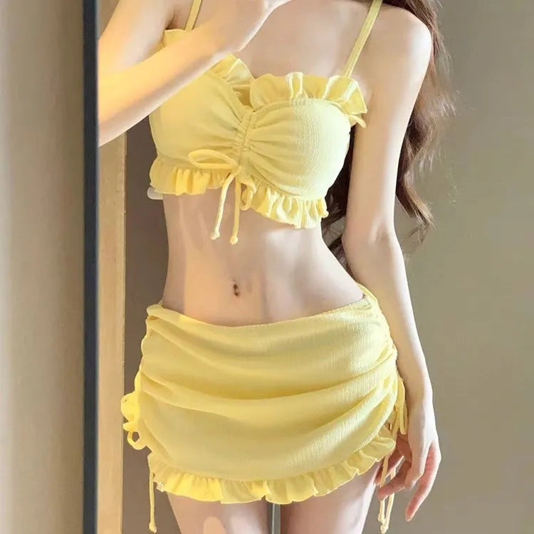 Women's split bikini swimsuit in milk silk fabric, shown in pitaya red, yellow, or black.