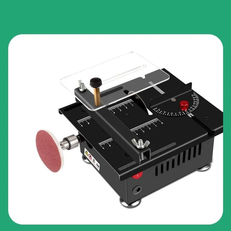 Compact lithium-ion cordless micro desktop saw with metal housing on a workbench.