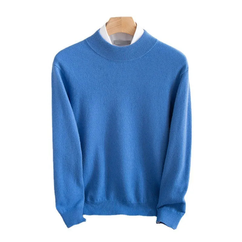 Man wearing a loose-fit half-collar wool sweater in a neutral colour, showing the knit texture and regular sleeve design.