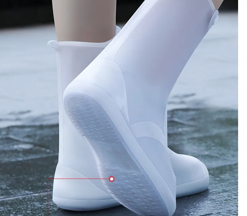 White high-top PVC reusable shoe covers for women, shown with size chart.
