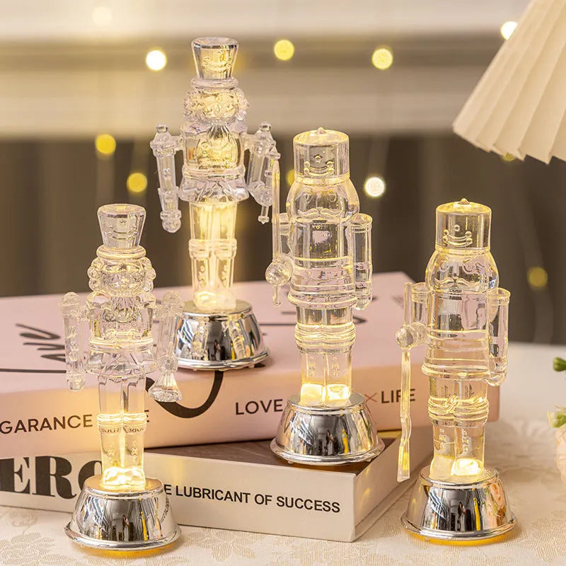 Transparent plastic walnut soldier Christmas nutcracker ornament on a desk.