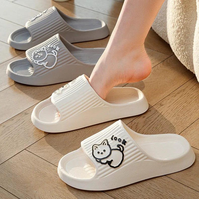 Women's green EVA flip-flop slippers with cute cat design and thick platform sole.