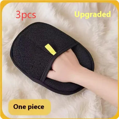 Black pet hair remover glove with silicone bristles for deshedding dogs and cats.